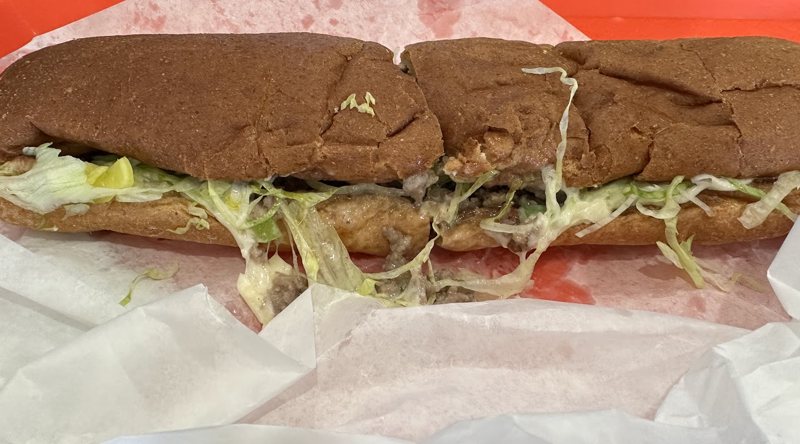 Hot sub with lettuce and melted cheese
